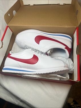 Nike White Sneakers with Red Swoosh and Blue Midsole Accent (Forest Gump’s)